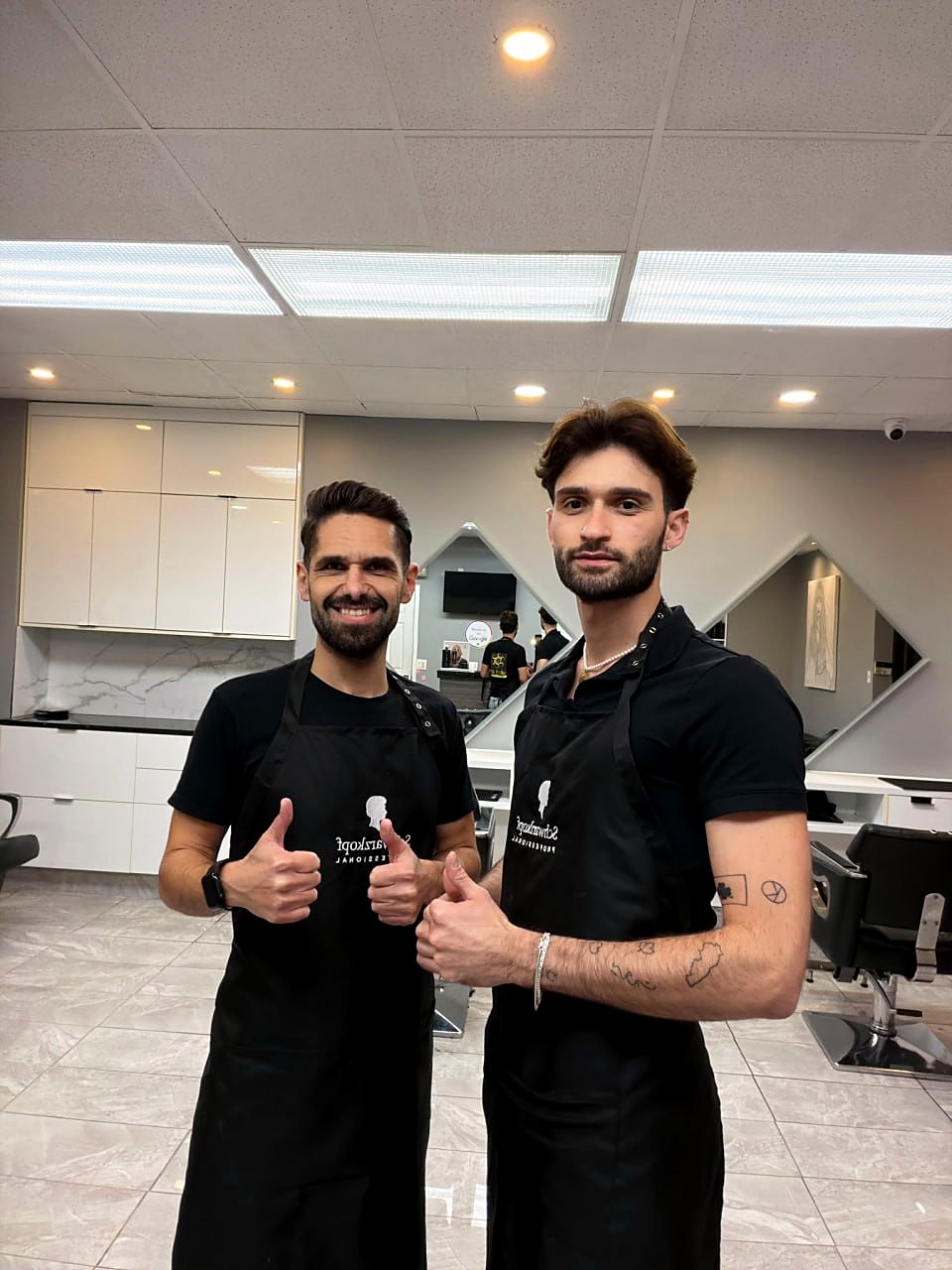 Dino and Kyle giving a thumbs up at Salon SiBelle